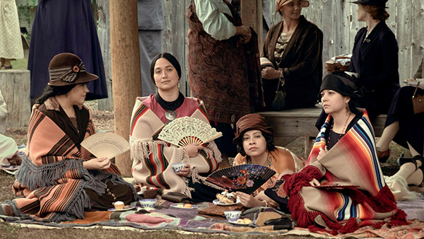 Osage women seated on the ground