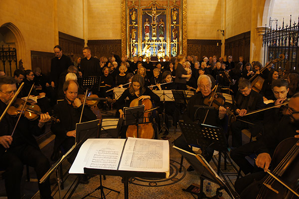 an orchestra playing St. Matthew Passion in a church