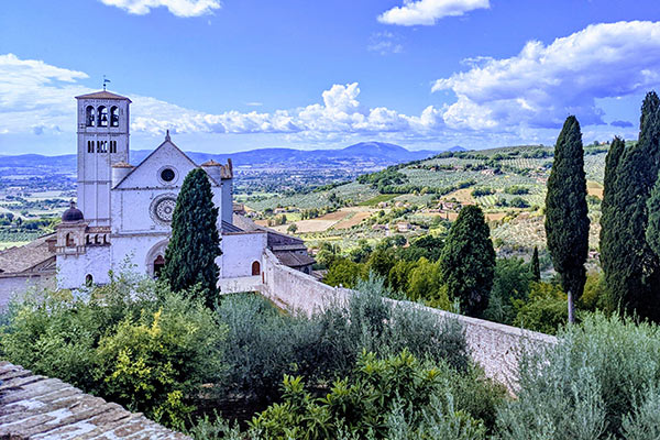 Church and scenic landscape in Assisi, Italy