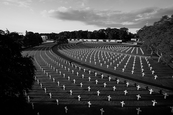 rows of headstones at Cambridge American Cemetery