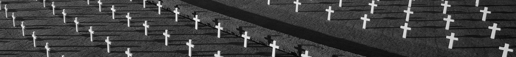 rows of headstones at Cambridge American Cemetery