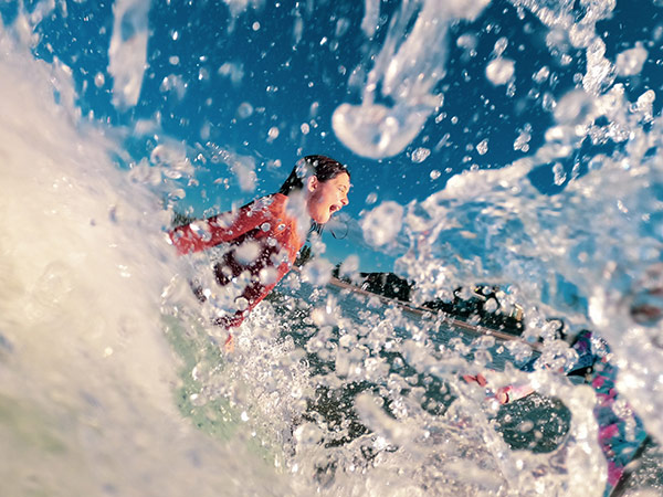 a girl splashing in water