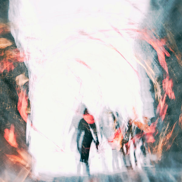 abstract photography depicting a line of fragmented silhouettes behind neon swirls