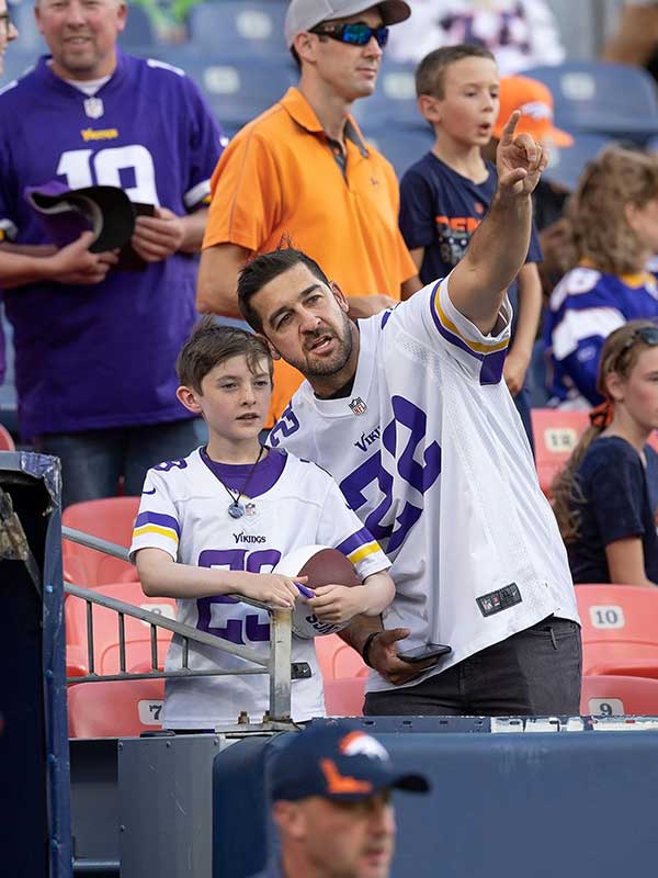 Young Vikings fan and dad enjoy a game 
