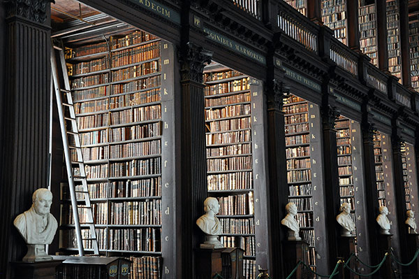tall shelves lined with old books in a Dublin library