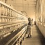 a young girl working in the Lancaster Cotton Mills