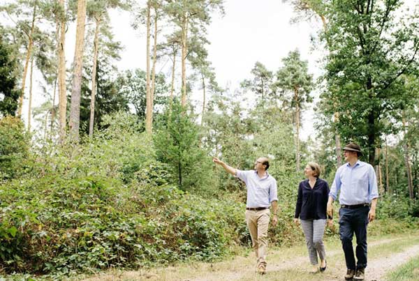 Multiple generations walking in the Family Forest with natural seeded biodiversity 