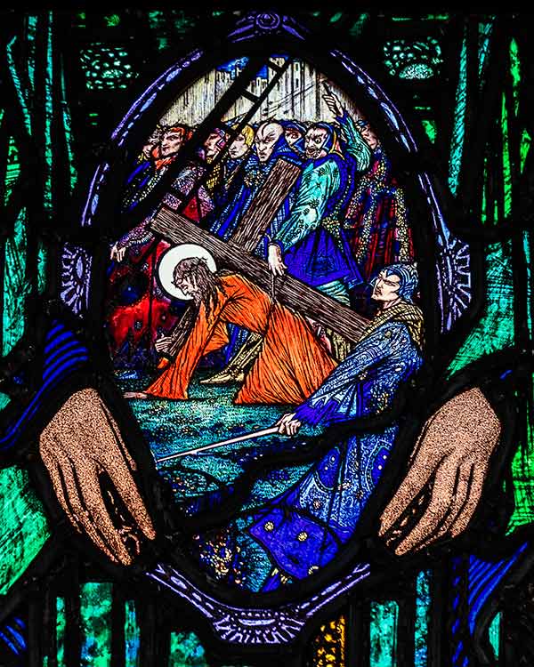 stained glass depicting Jesus falling for the first time