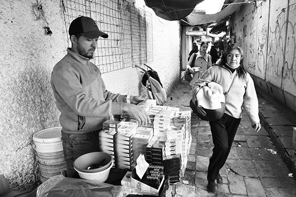 a man selling cigarettes