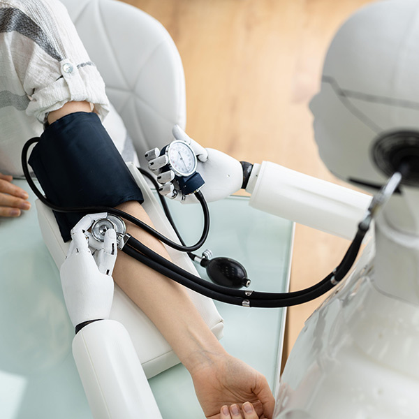 a robot doctor checking the blood pressure of a patient