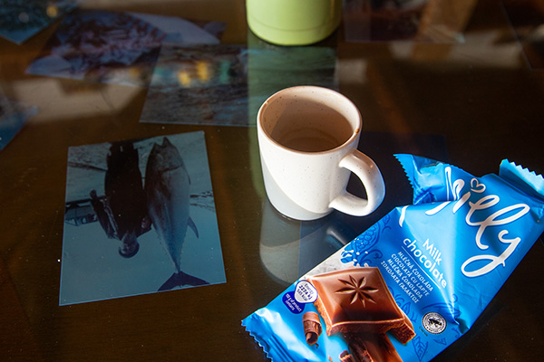 a mug and a chocolate bar on a table