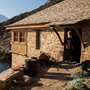 a man standing in the doorway of his home
