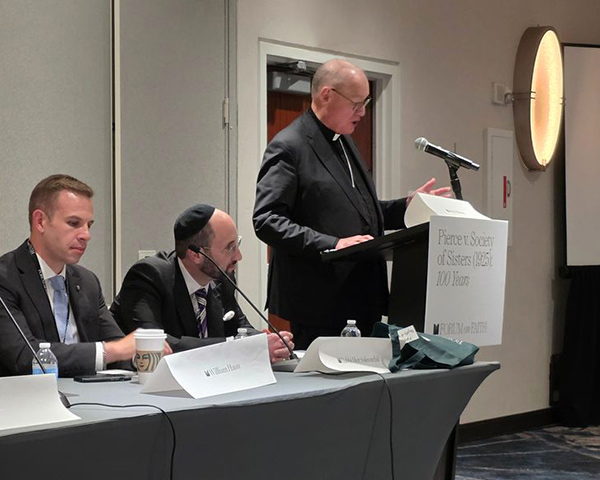 panelists sitting at a table