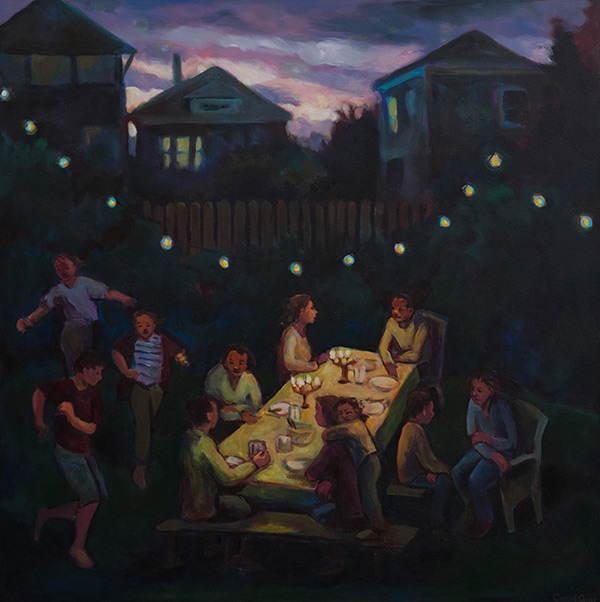 friends and family having supper in a backyard