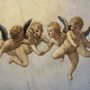 cherubs flying in the sky