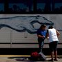 a passenger boarding a Greyhound bus