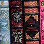 classic books lined up in a shop window