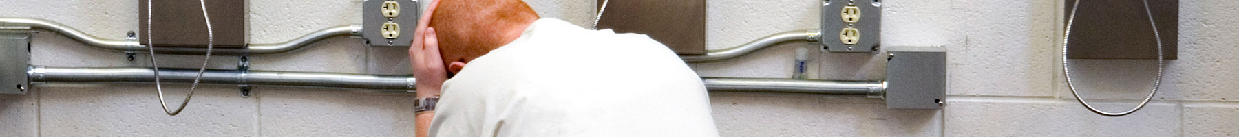 a prisoner making a phone call