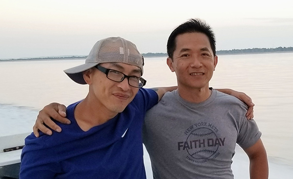 Lam and Nicky on a boat