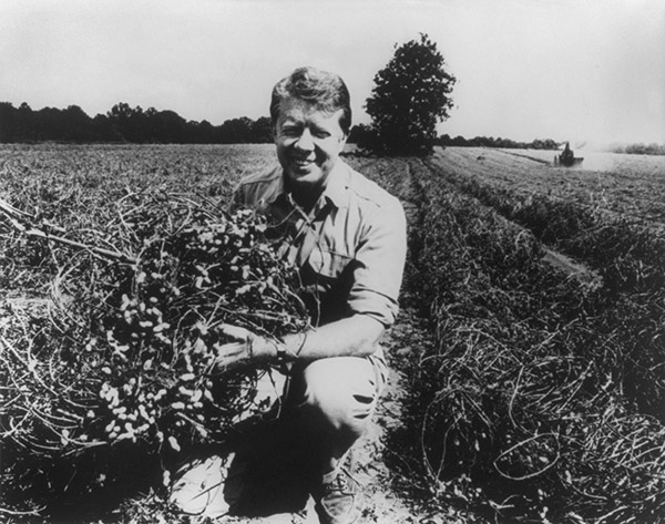 black and white photo of Jimmy Carter on his peanut farm