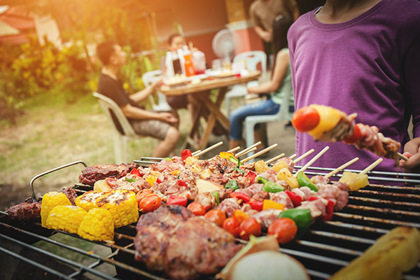 people enjoying a bbq in summer