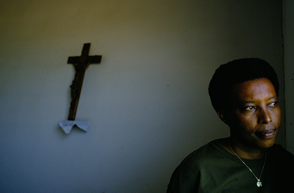 a woman looking out of a window