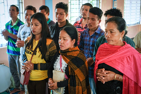 Faithful Christians worship in the Catholic St. Paul's Church in the village of Kachuchera, India.