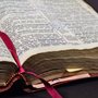 an open Bible lying on a table