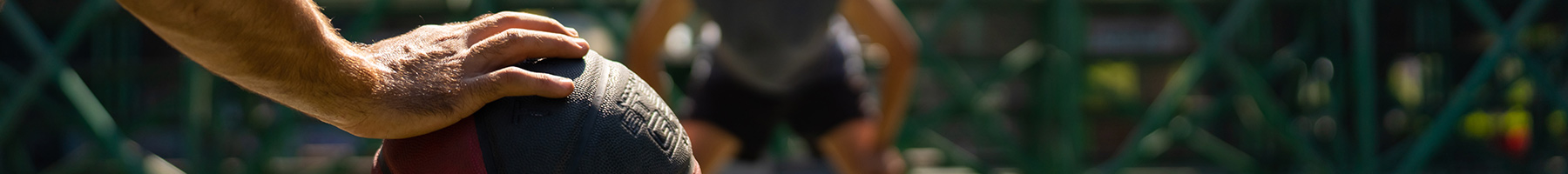 two guys playing basketball