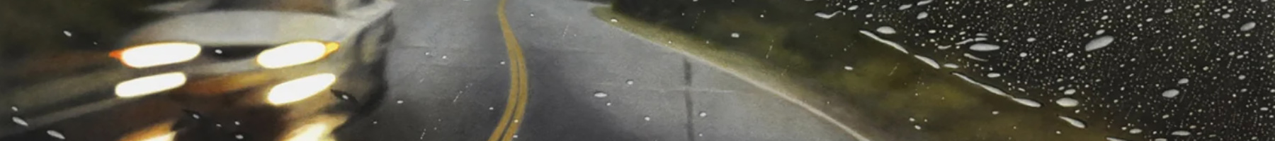 illustration of rain covered windshield on a country road