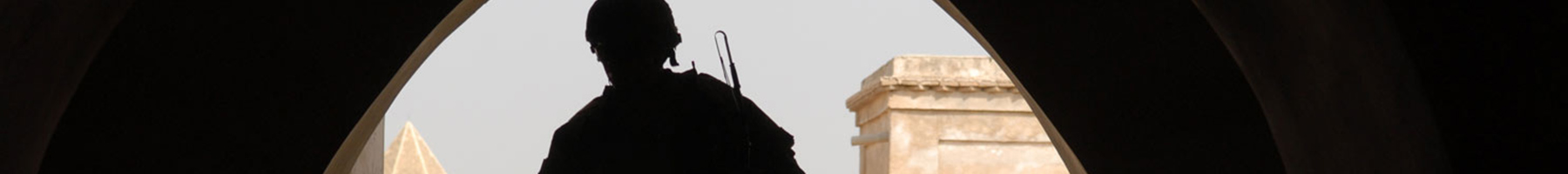 silhouette of an American soldier in a doorway in Iraq