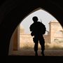 silhouette of an American soldier in a doorway in Iraq