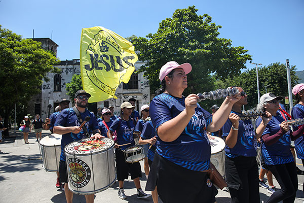 a samba band marching on a street