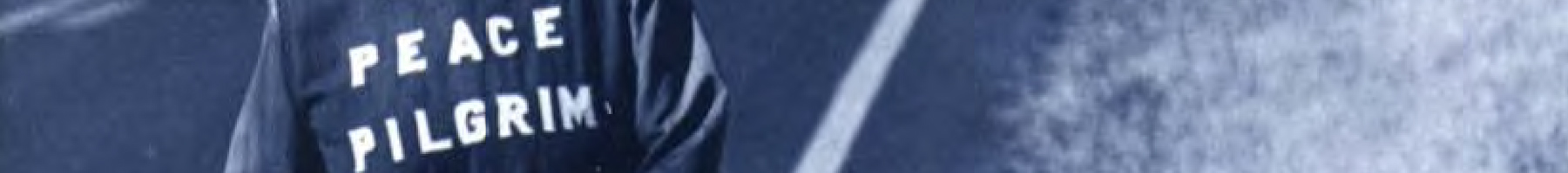 Peace Pilgrim walking down a country road