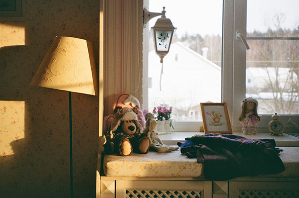 sunlight shining through a bedroom window