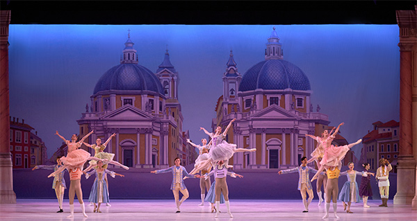 ballet dancers performing on a stage