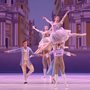 ballet dancers performing on a stage