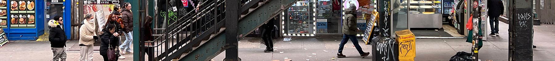 street and stairs to elevated train tracks