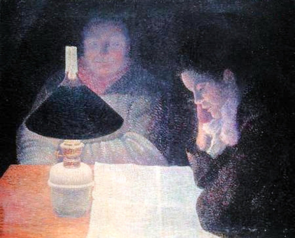 two people reading by lamplight