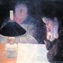 two people reading by lamplight