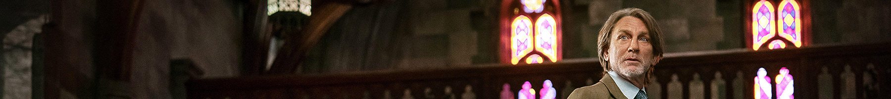 two men standing in a church