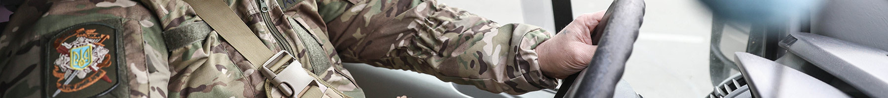 a chaplain driving a car