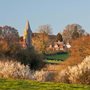 English church in surrounded by farm