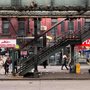 street and stairs to elevated train tracks