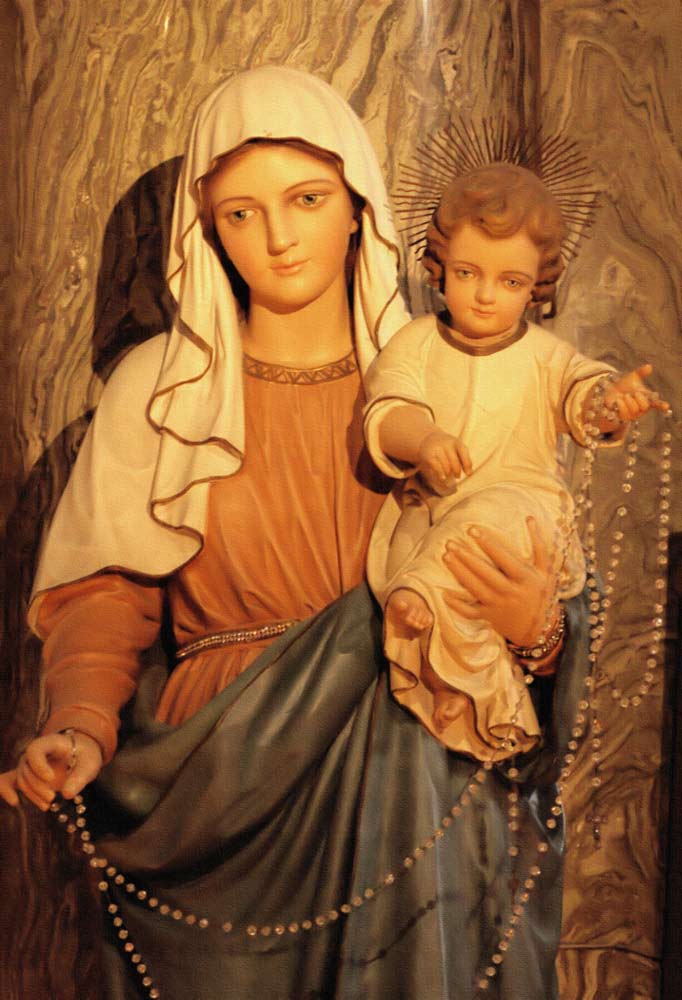 Carved sculpture of Madonna and child