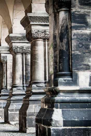 Image of large gray stone arches