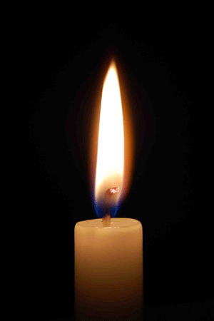 A small, lighted candle.