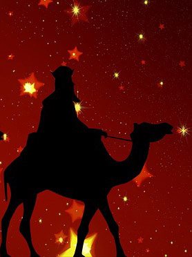 Silhouettes of the three kings on camels with a red background and stars