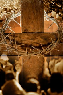 people gathered around the cross