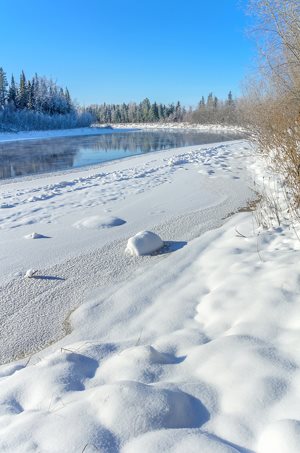 snowy river in winter